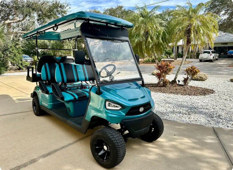 Golf cart for rent: $75/day - 6 passenger - can be parked at the beach entrance