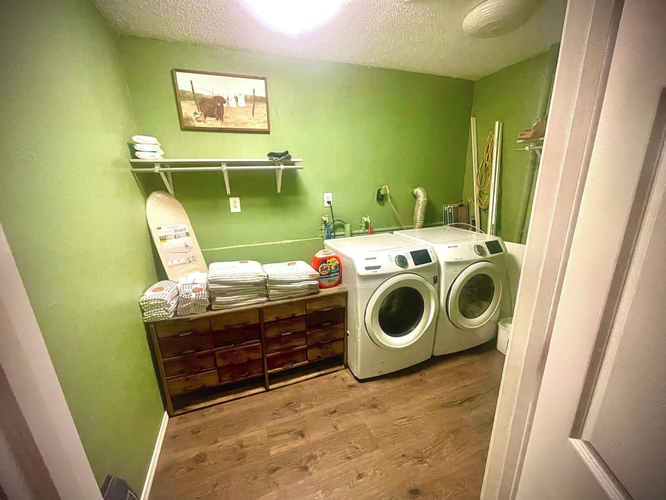 Laundry room. Free. Has soaps and dryer sheets. And cleaning supplies if needed