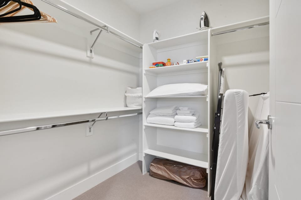 Closet and storage space with wardrobe at EcoLoft Retreat, Espadin LoHi Denver.
