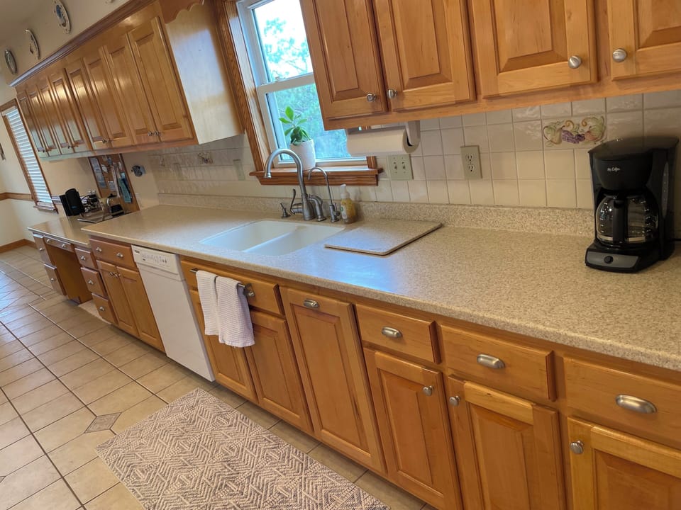 A deep sink with a Keurig for fresh morning coffee. Plenty of space to cook! 