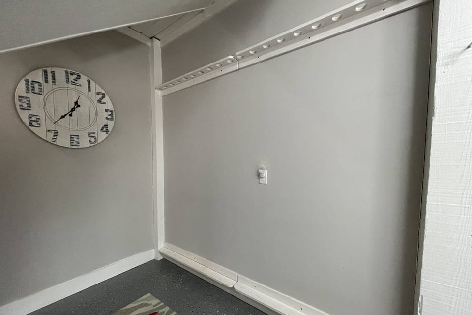 Between the Base of the Stairs & the Lower Level Bedroom #4, you will find a Rod Rack to Hold your Fishing Rods.