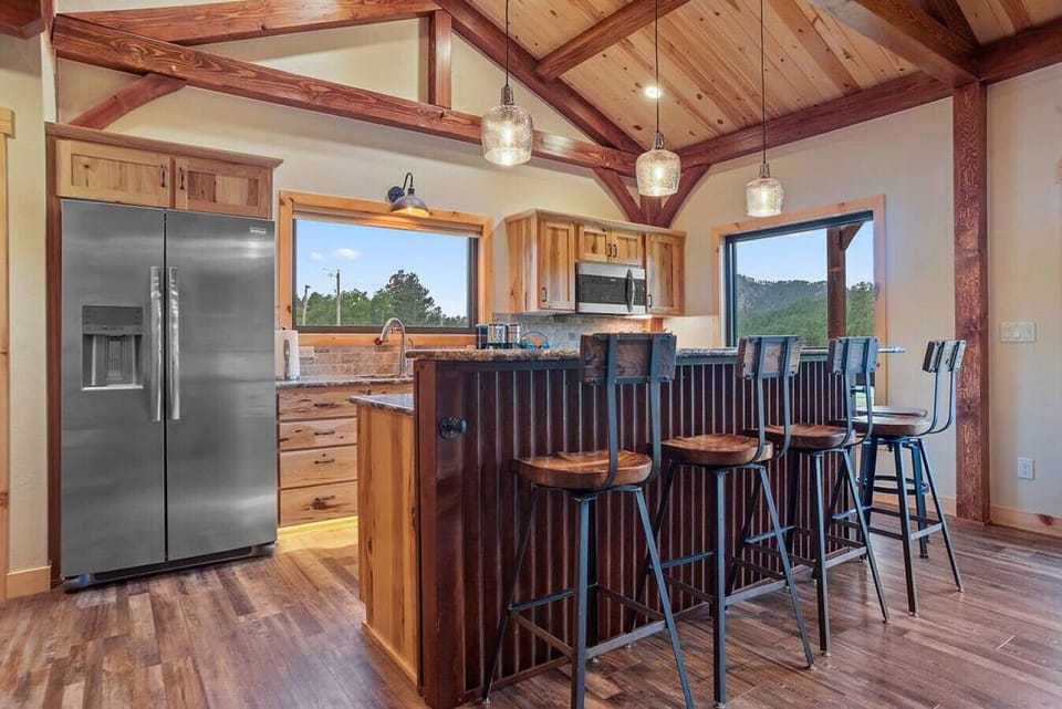 Well-lighted and well-equipped kitchen perfect for a family or group of friends who love to cook