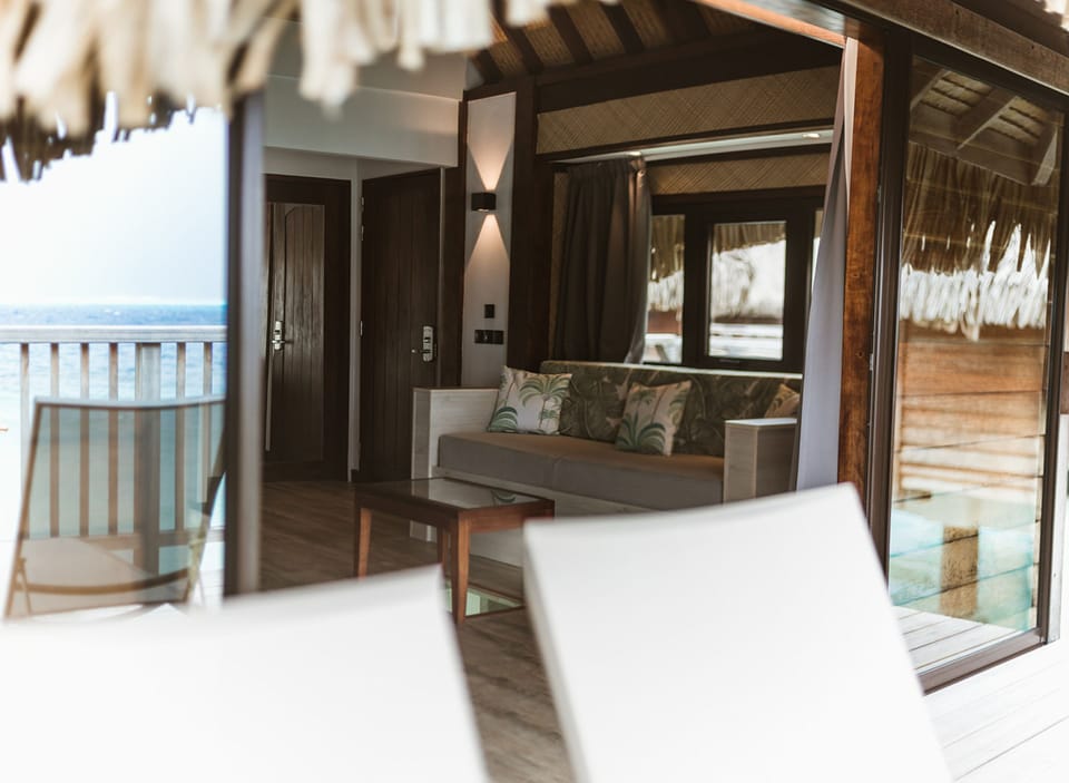 Premium Overwater Bungalow | Living area | Flat-screen TV
