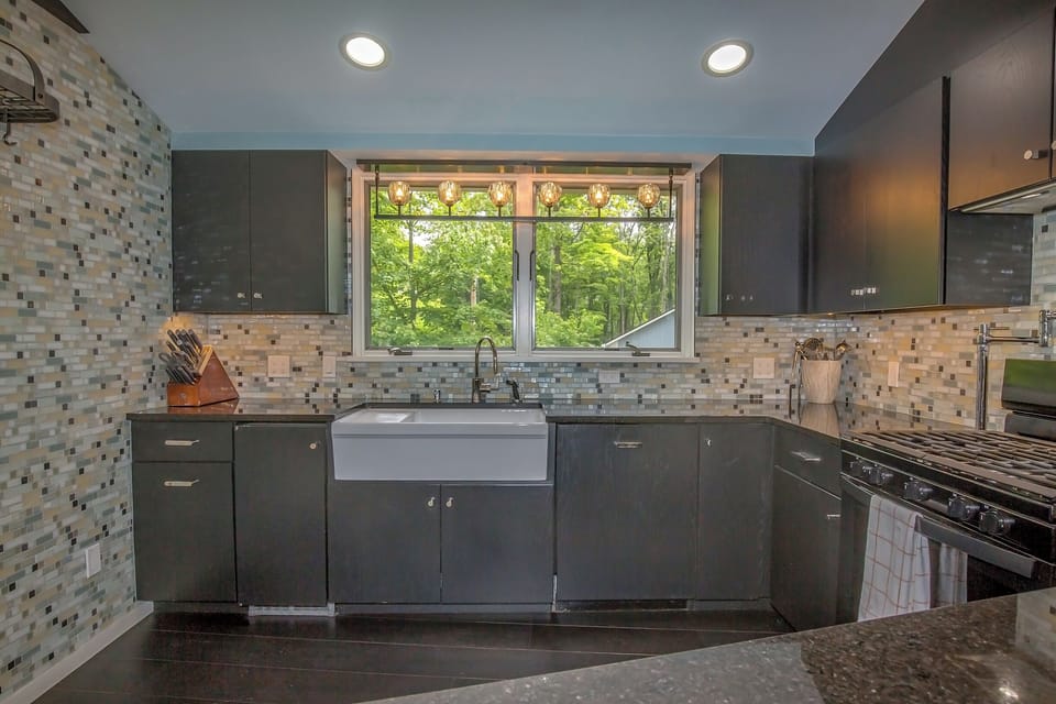 Kitchen is roomy and has wonderful view of front gardens