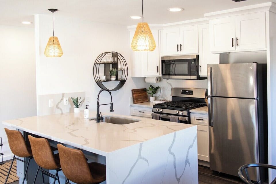 Fully stocked chef's kitchen for enjoying meals in.