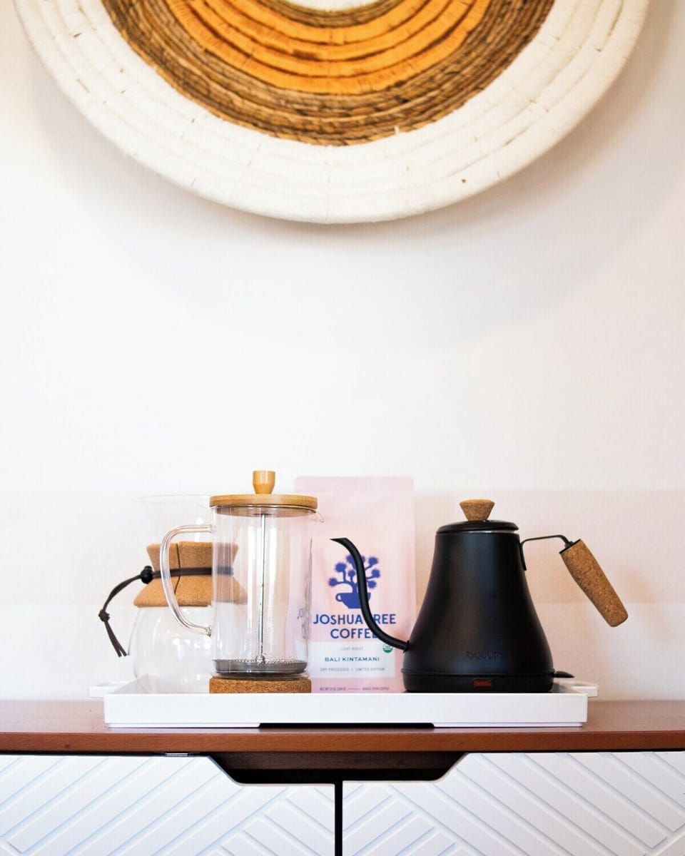 Coffee station with drip pot, French press, pour over. Local coffee provided. The Green Palm JT features amenities for the barista AND chef!