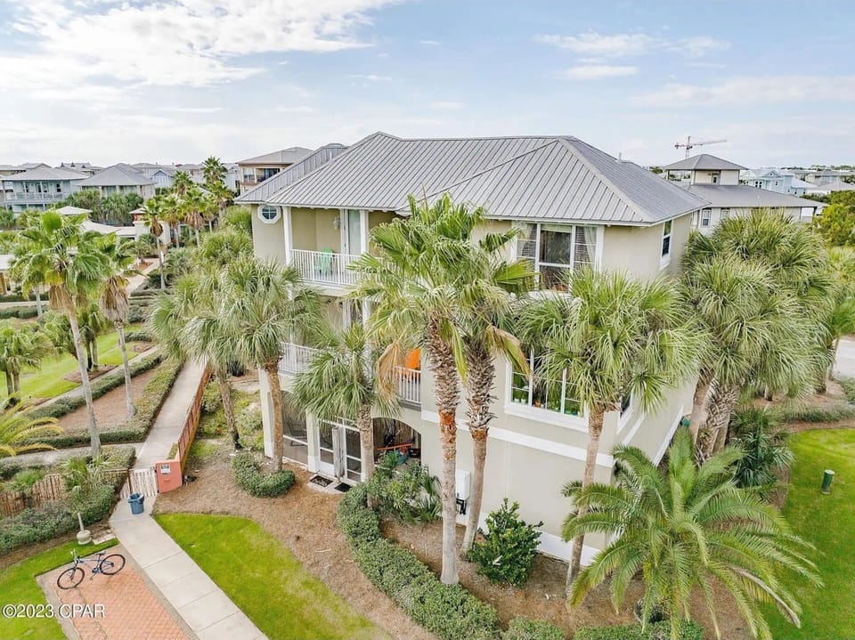 One of very few homes with green space next to the home to get outside and enjoy