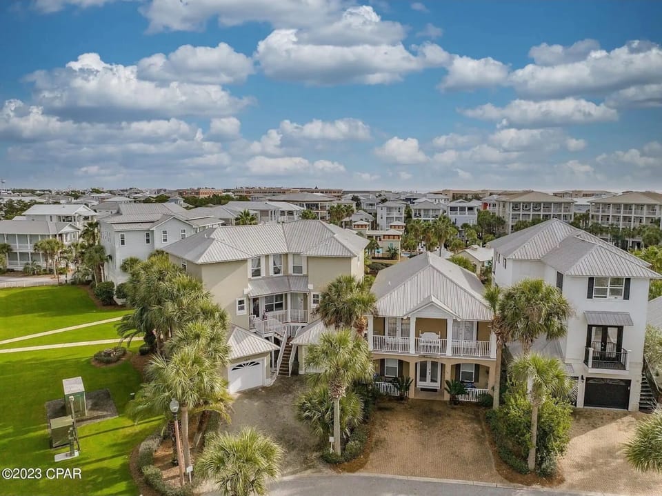 One of very few homes with green space next to the home to get outside and enjoy