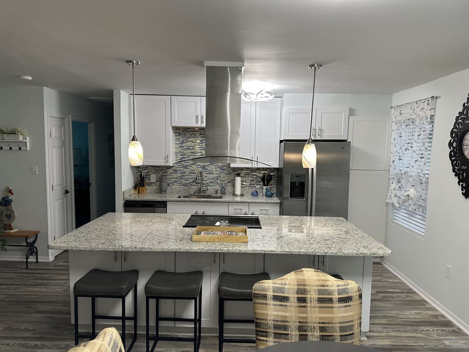 New  spacious kitchen with granite island, stainless appliances, & everything 