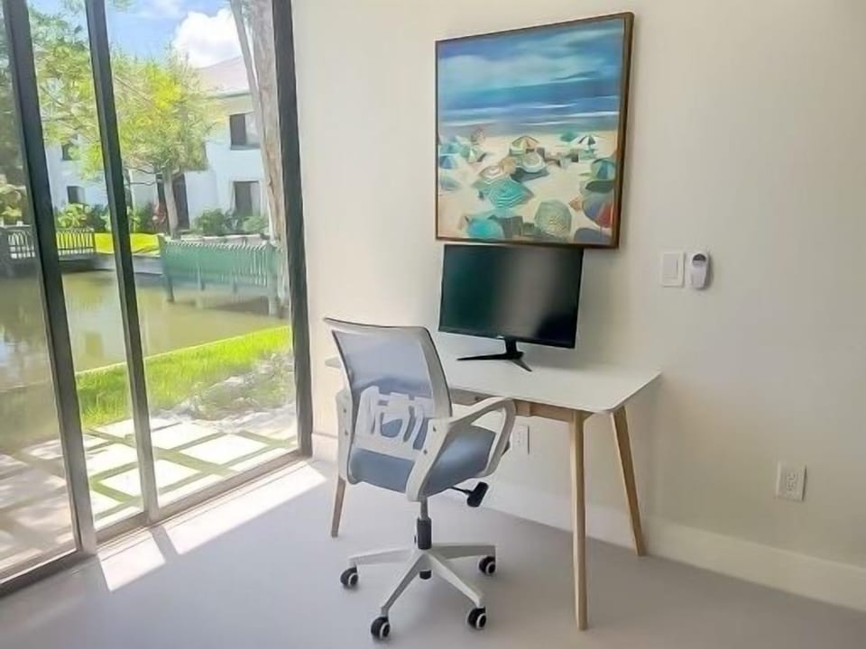 Work space with a monitor and printer.