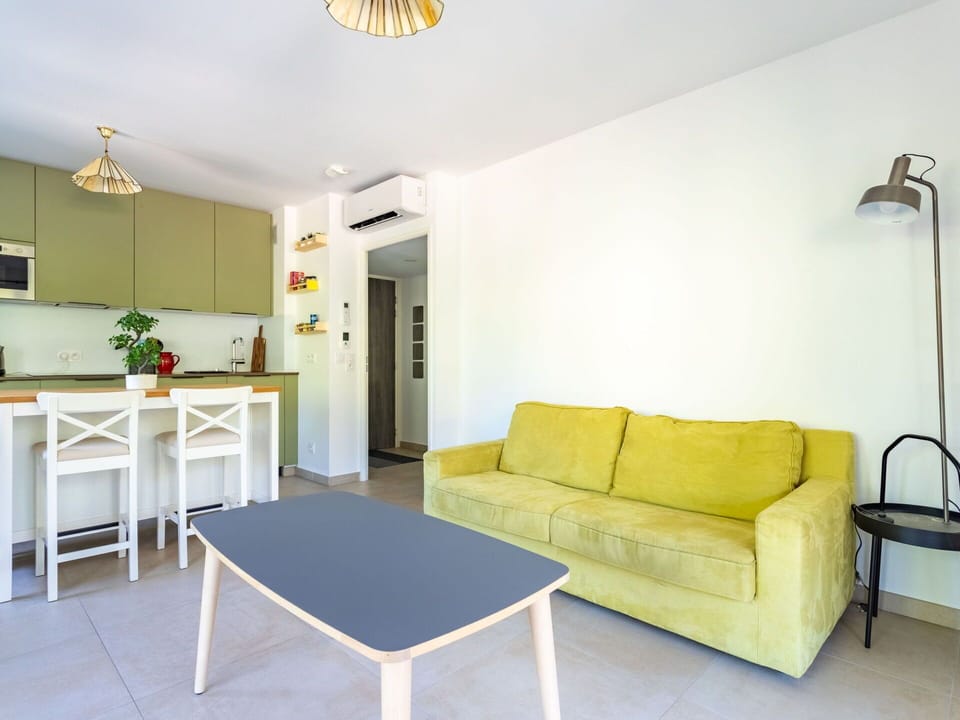 Table, Furniture, Property, Couch, Lighting, Interior Design, Yellow, Wood, Comfort, Building