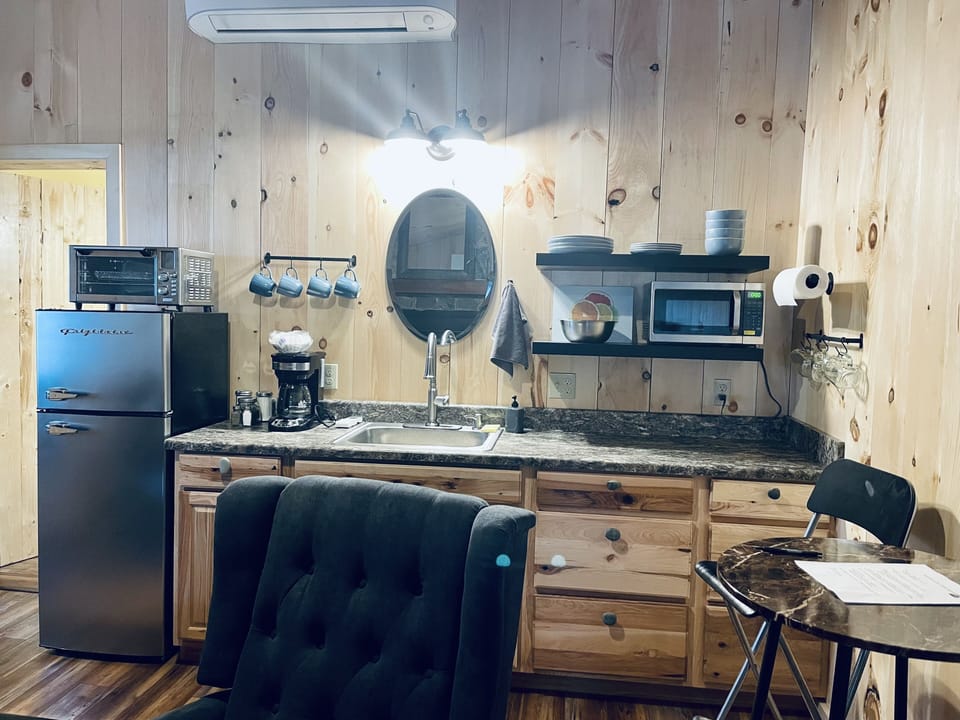 Kitchenette with bathroom entrance to the left