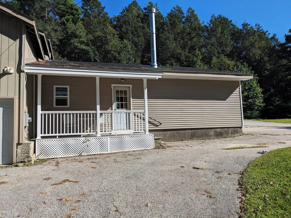 Front entrance with your parking spot