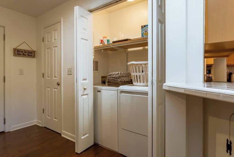 Laundry closet on Main level in Hallway next to Kitchen