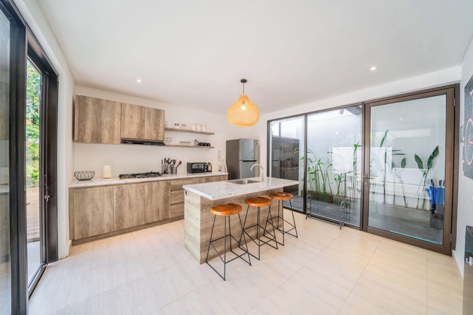 Luxury Villa | Private kitchen | Fridge, microwave, stovetop, toaster