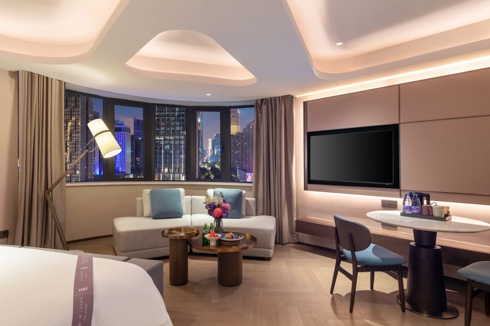 Studio Room | Down comforters, free minibar items, in-room safe, blackout drapes