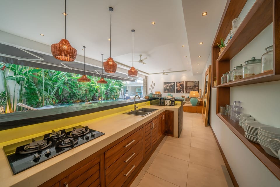 Luxury Villa | Private kitchen | Fridge, microwave, stovetop, toaster