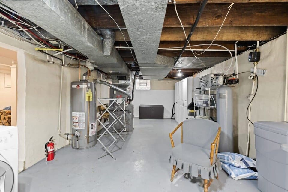 Relax with comfortable seating in the laundry area, making your chores a more pleasant experience.
