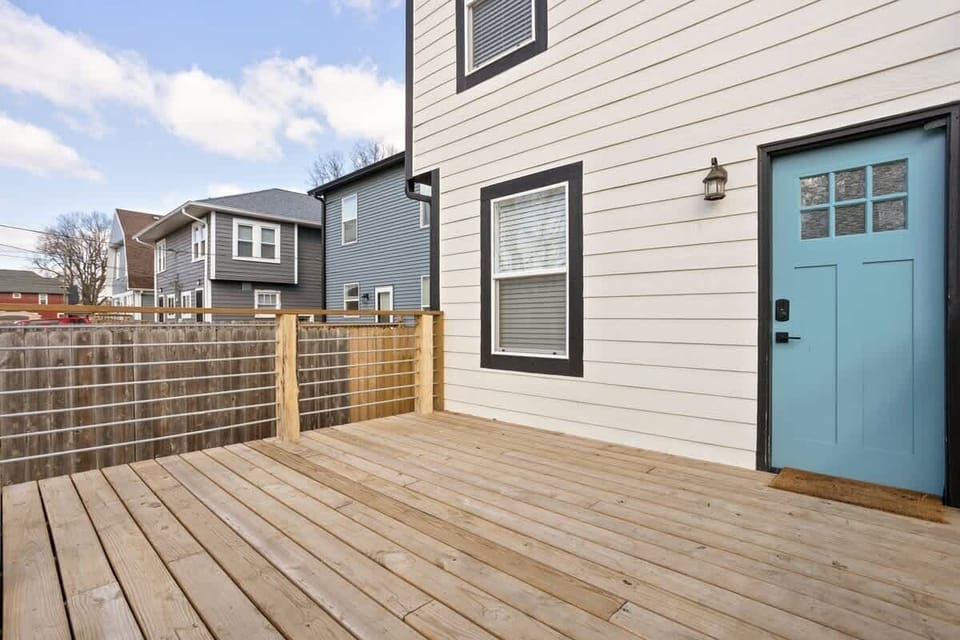 Experience the charm of our open back porch, offering a delightful and relaxing outdoor space.