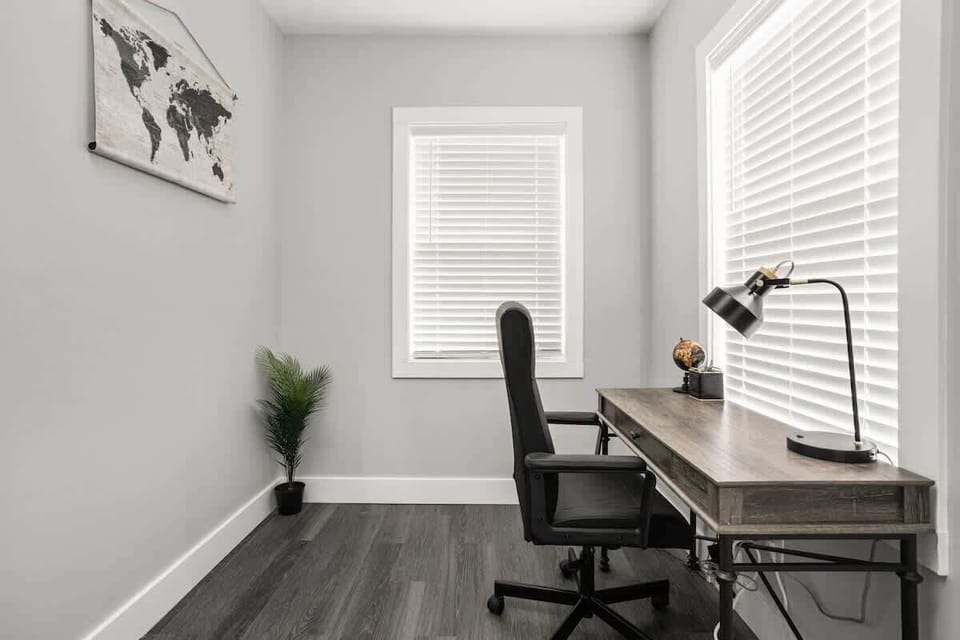 Office Retreat: Bright workspace with modern decor, perfect for focused productivity and inspiration!