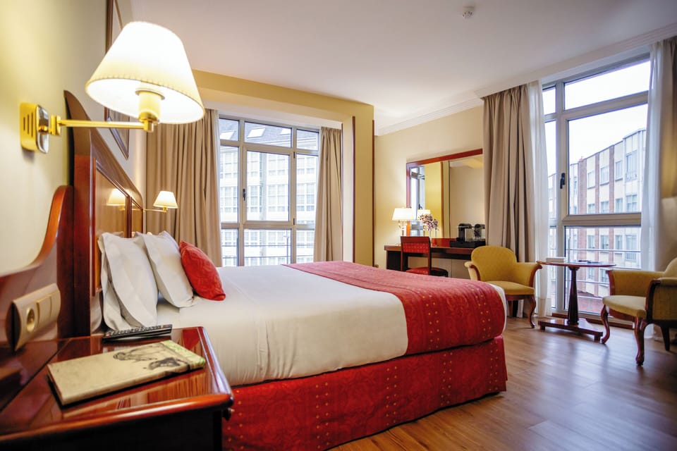 Family Room, City View (2 adults + 2 children) | Minibar, in-room safe, desk, blackout drapes