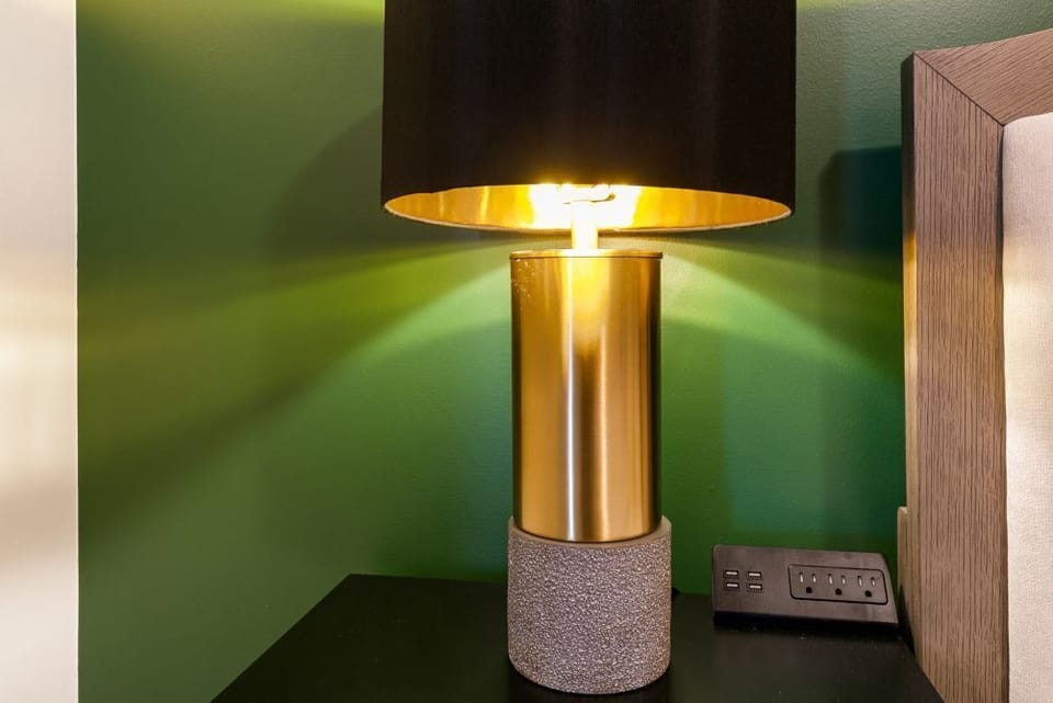 Charging stations available in both green and black accent bedrooms