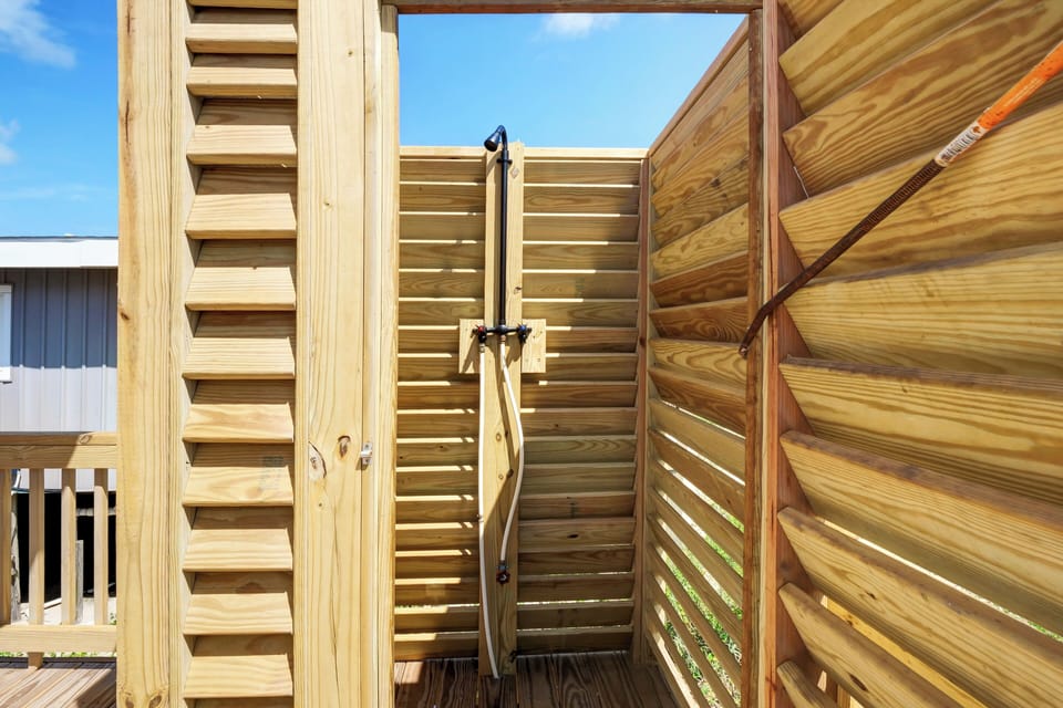 Outdoor shower located on back deck
