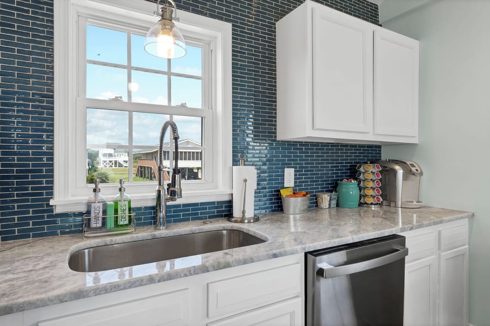 Fully stocked kitchen with coffee bar