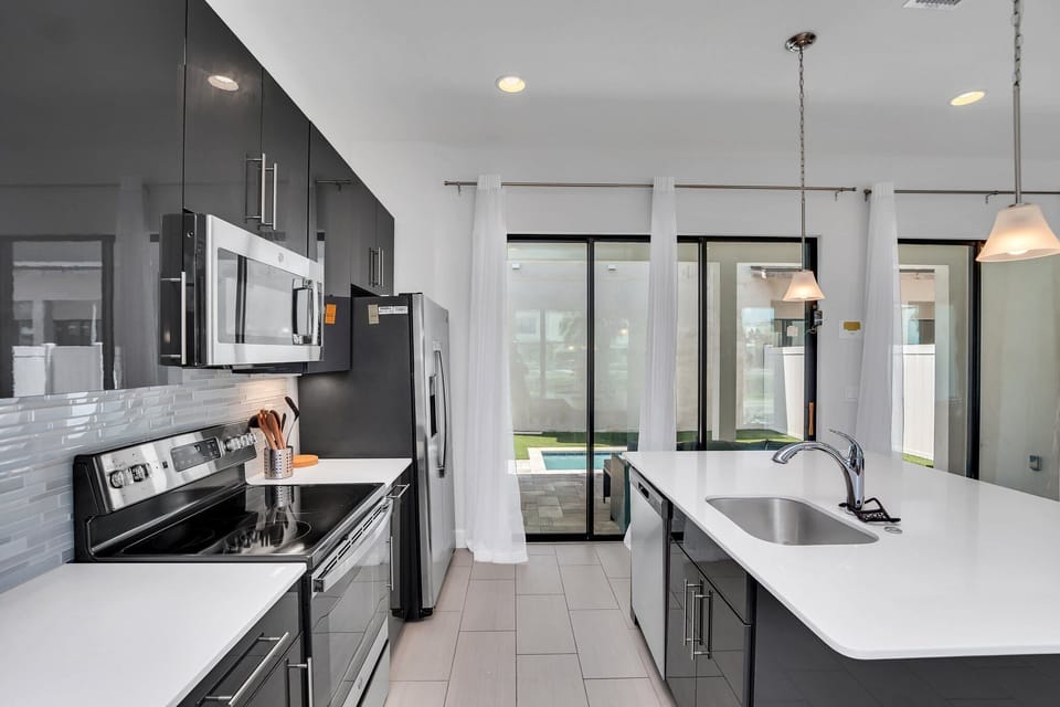 Natural light floods into the living space through the large patio doors. 