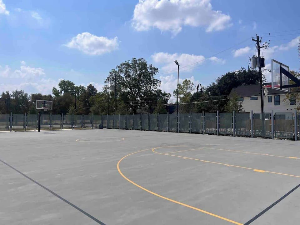 Full outdoor basketball court short stroll from the house.