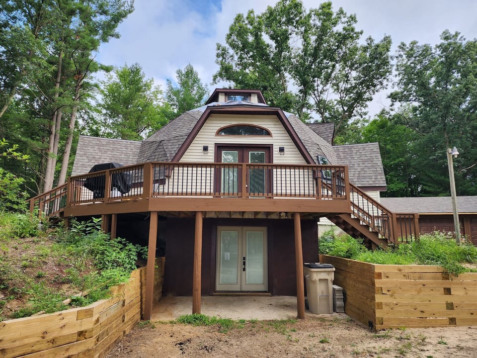 Deck and walk out to front driveway area