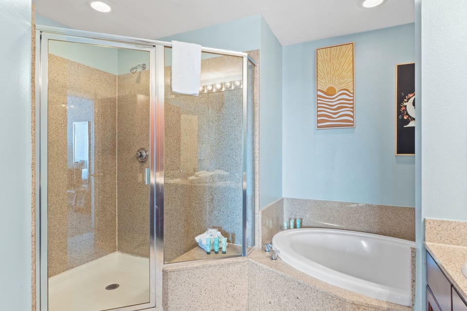 Primary Bathroom with Garden Tub and Stand-Up Shower with double vanity sinks