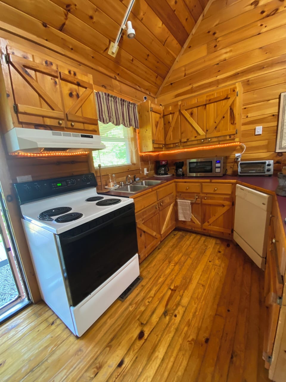 easy access from the kitchen to the full deck with lots of seating and views