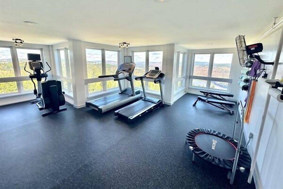 Mountain Lodge has a new gym with a view all the way down to the lake (free for guests).