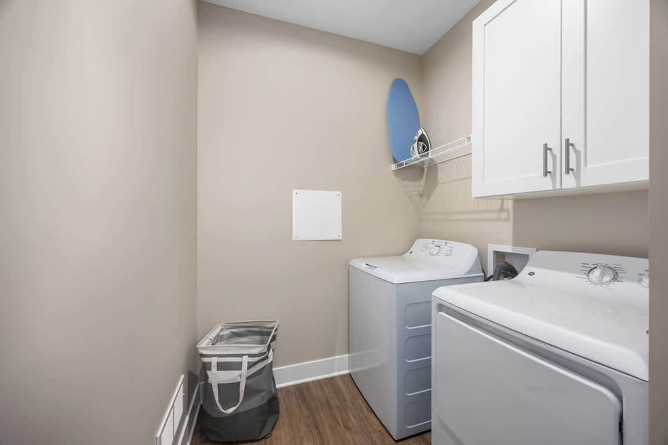 Convenient laundry room with washer and dryer for your stay.