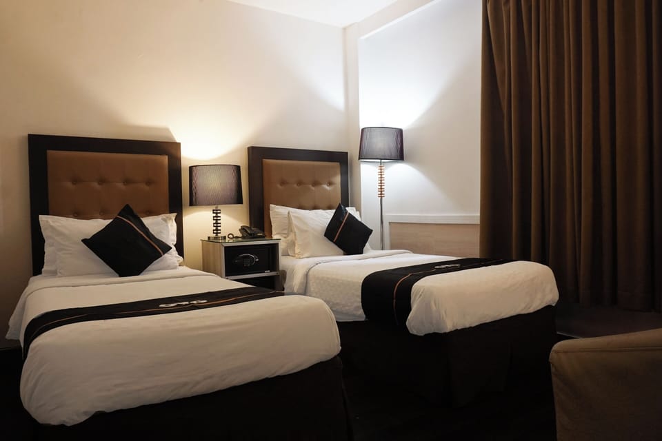 Desk, laptop workspace, free WiFi, bed sheets