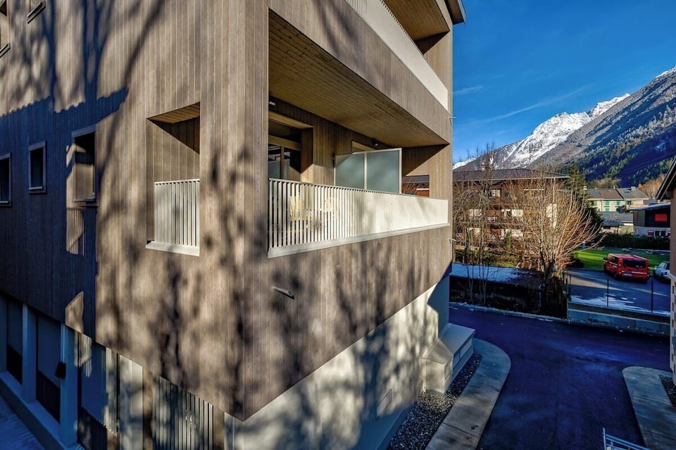 Double-height, covered balcony