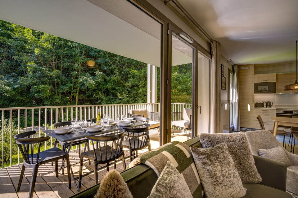 Living area with glass doors onto balcony