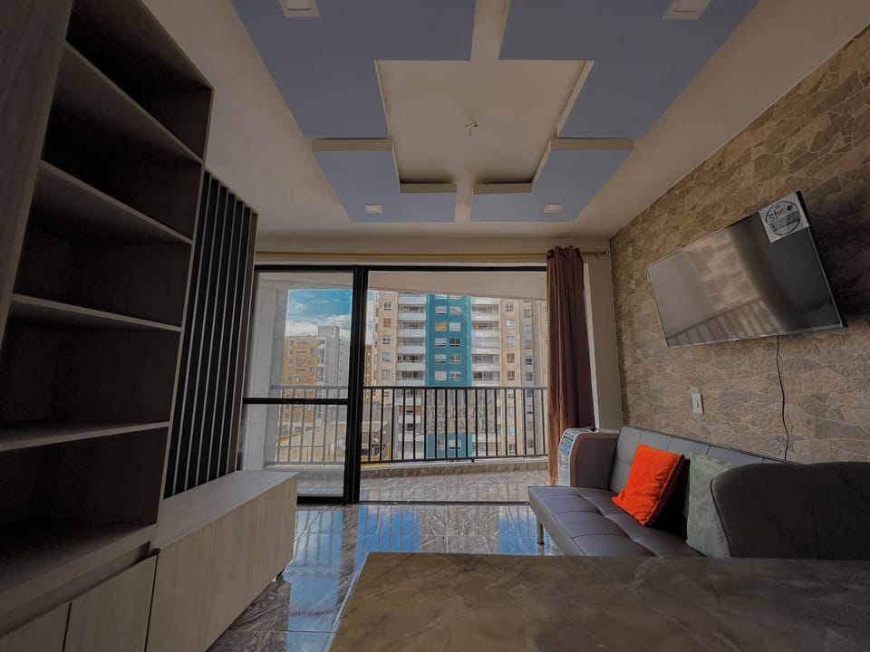 Basic Single Room | Living area | Flat-screen TV