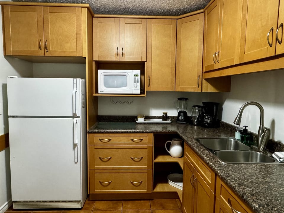 Full Kitchen with baking accessories.
