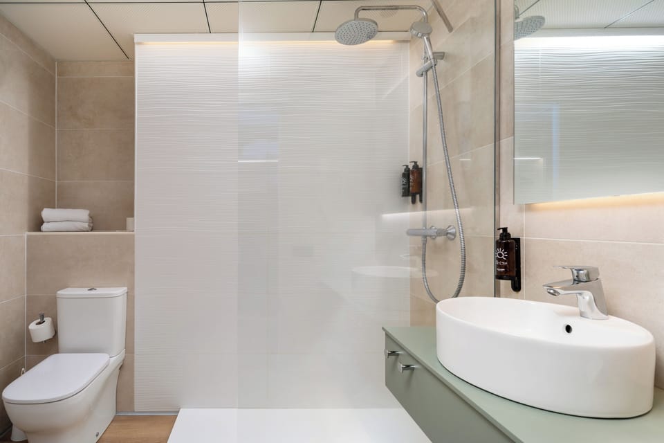 Shower, eco-friendly toiletries, hair dryer, bidet