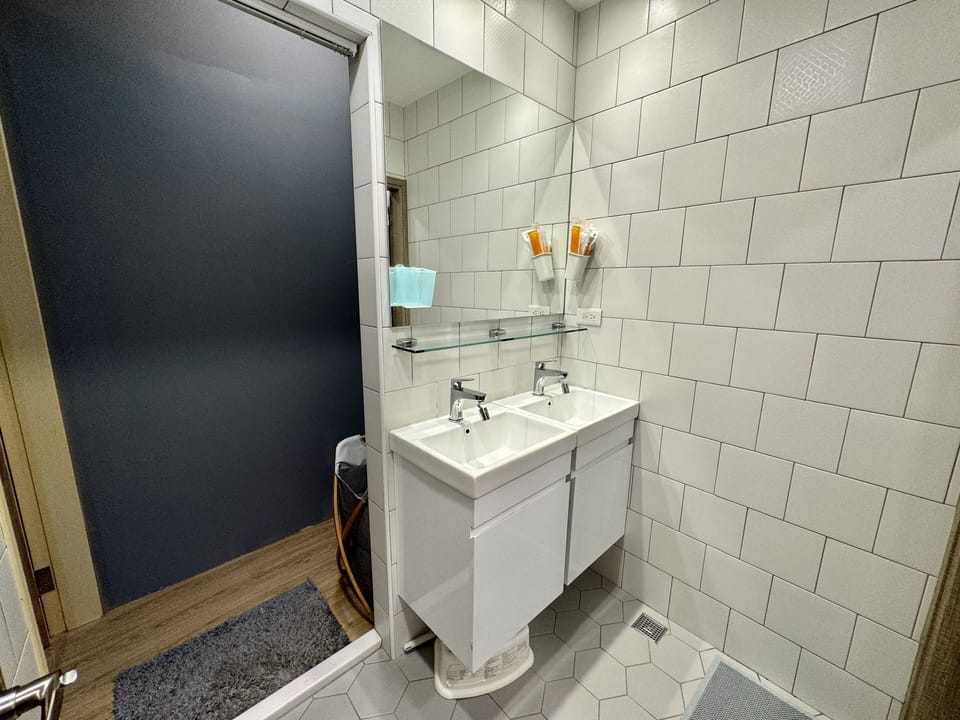 Comfort House | Bathroom | Hair dryer, slippers