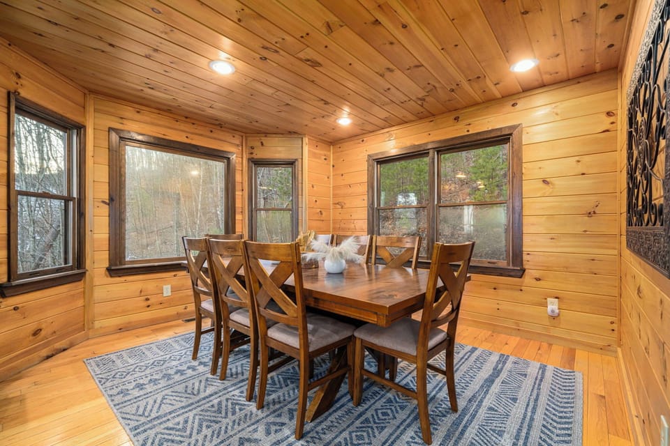 [Main level: Dining] Seats 9 and is connected to the kitchen