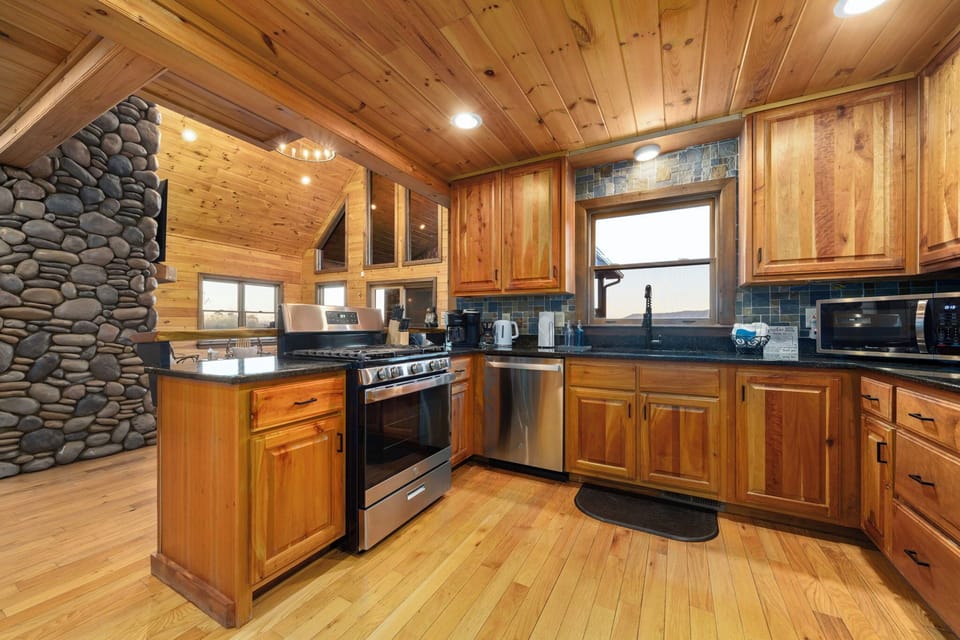 [Main level: Kitchen] Fully equipped kitchen w/ dishes, cookware, drip/pour over