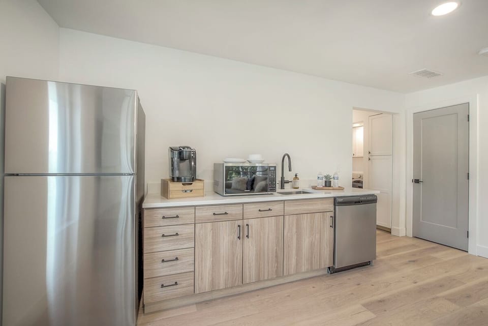 Kitchenette feature a fully stocked coffee station, air-fryer, DW, Fridge & more