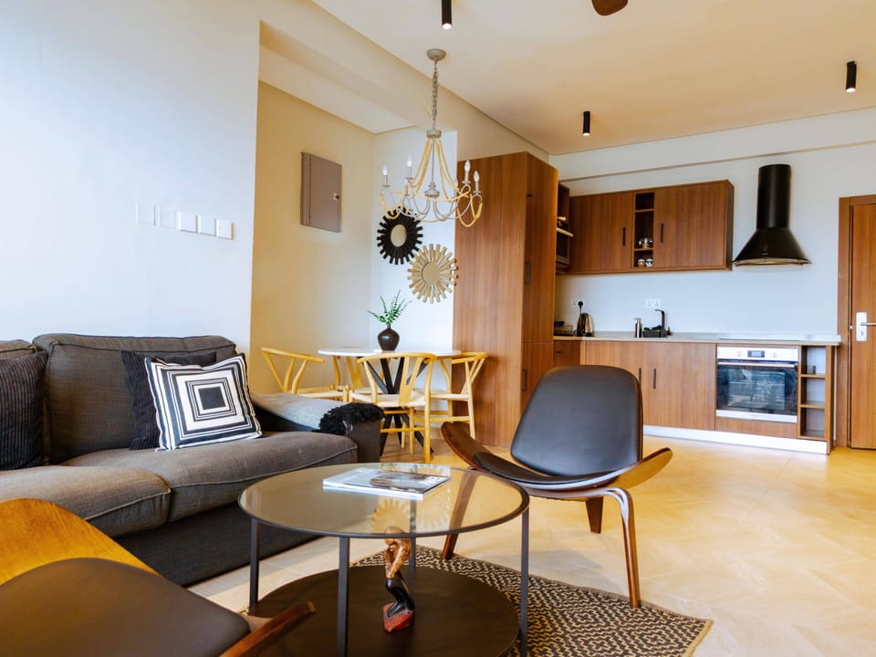 Deluxe Apartment, 2 Bedrooms, Balcony, Sea View | Living area | 40-inch Smart TV with satellite channels, Netflix, Hulu