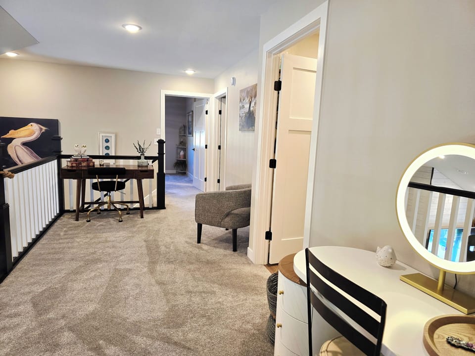 upstairs make-up vanity, office desk space and lounge area