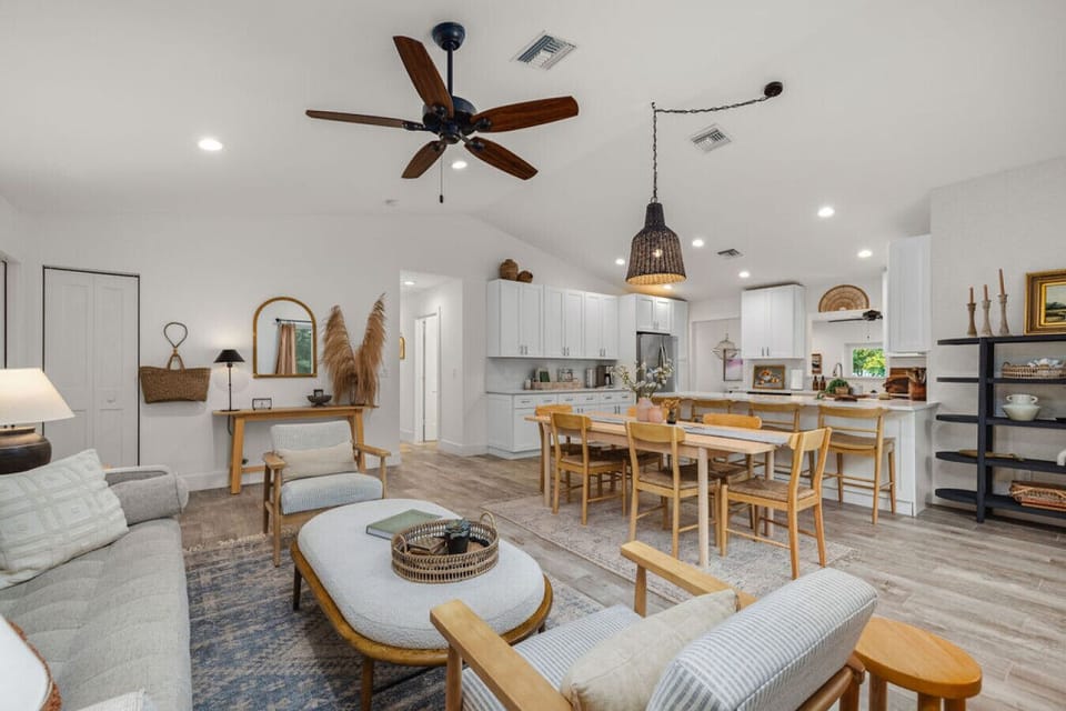 The open living room offers modern elegance and a welcoming atmosphere for relaxing or entertaining.