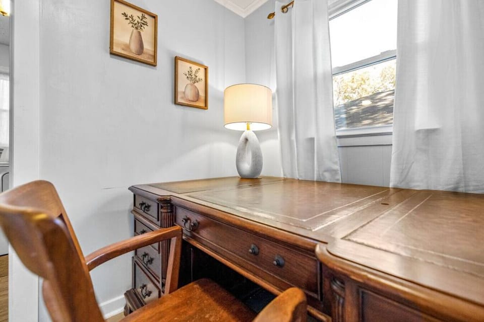 A quiet workspace with all the essentials—perfect for catching up on work while away.