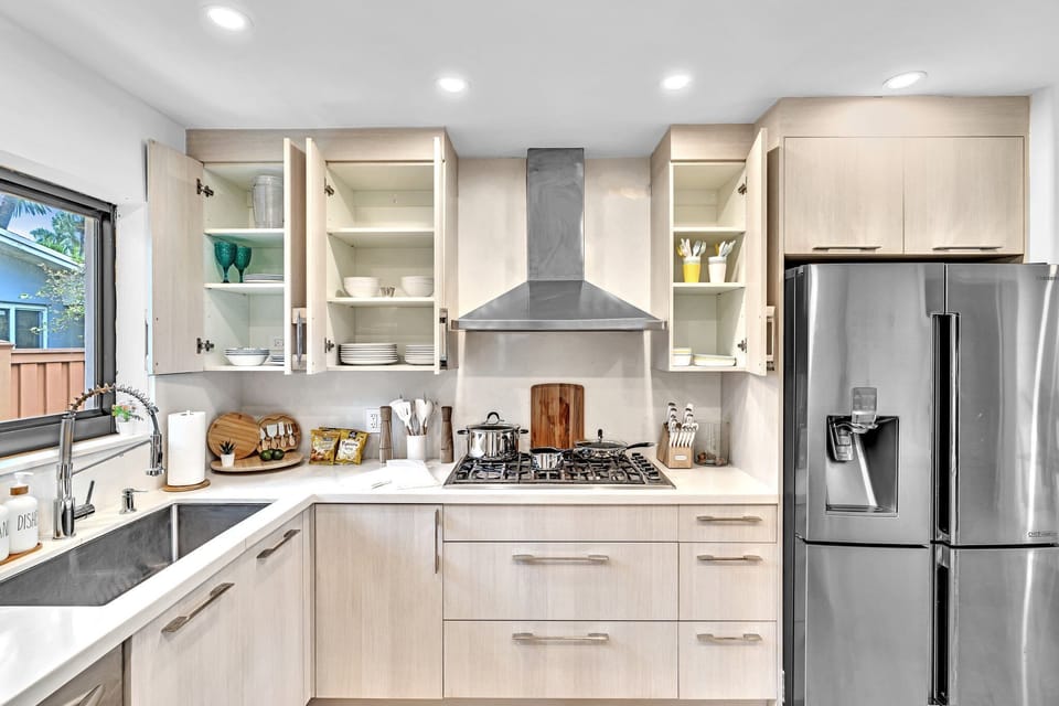 Modern kitchen with full appliances — cook and share meals with ease.